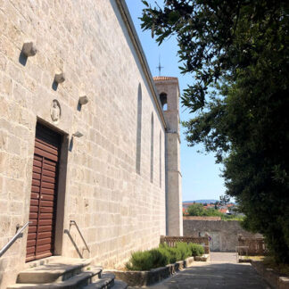 Churchyard, calm, birds, people walking by in slippers flip-flops, distant talking, kids, cars and motorbikes passing close-by, distant traffic, Krk, Croatia