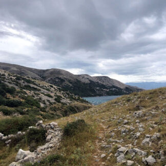 Mountain near two ocean beaches, windy, distant traffic, birds, silent, calm, empty, Skrila, Croatia