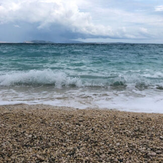Ocean waves, medium waves, close to shore, beach, pebble stones, Skrila, Croatia