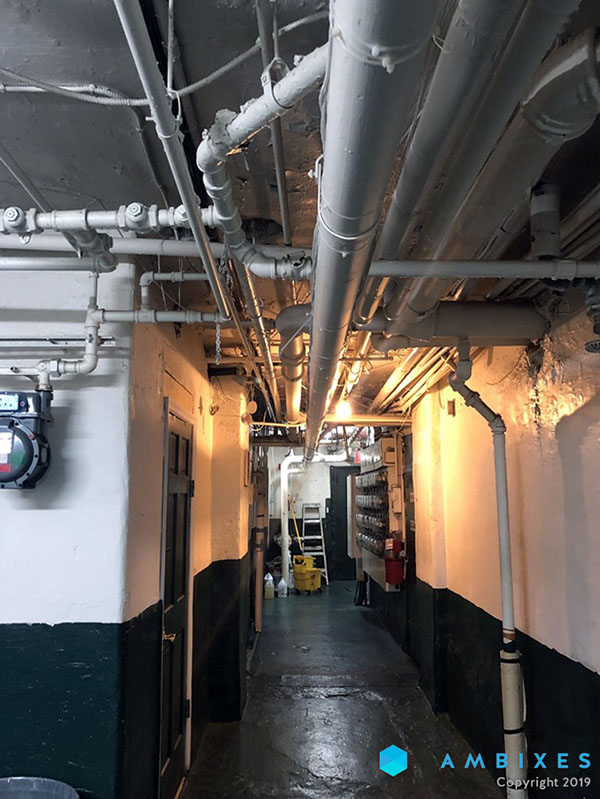 Basement, condo, elevator and laundry room, metal parts of clothing clinking, distant people, neighbors, New York City, USA