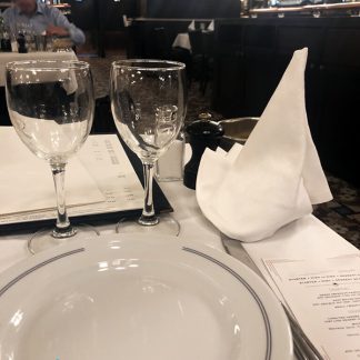 Restaurant, fancy, busy, dishes clinking, people talking, distant kitchen, Paris, France